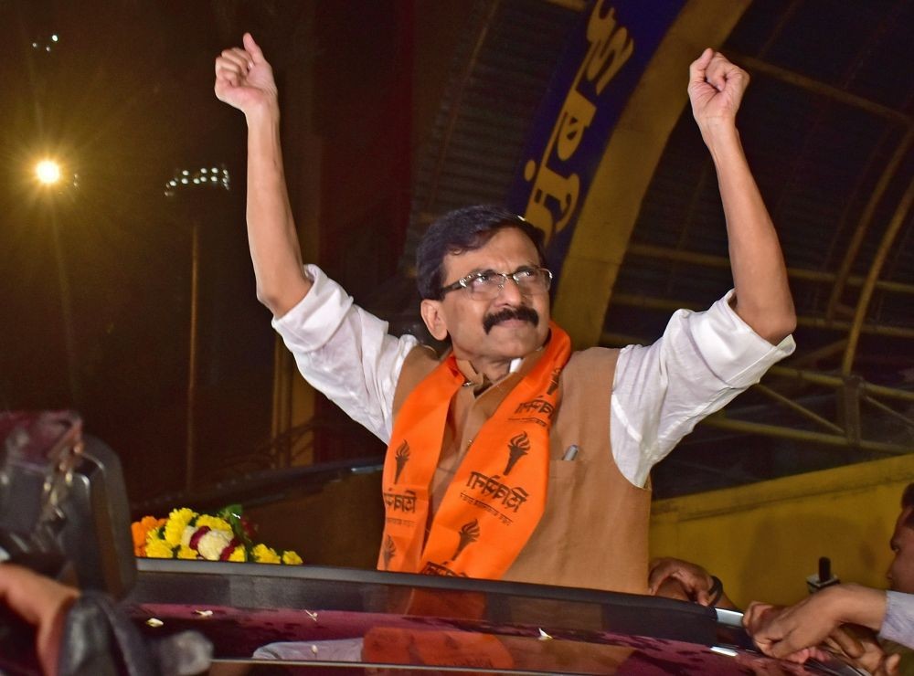 Mumbai:Shiv Sena(Uddhav Balasaheb Thackeray) MP Sanjay Raut waves to supporters after being release from Arthur road jail in Mumbai on Wednesday November 09,2022.(Photo: Megha Jadhav/IANS)